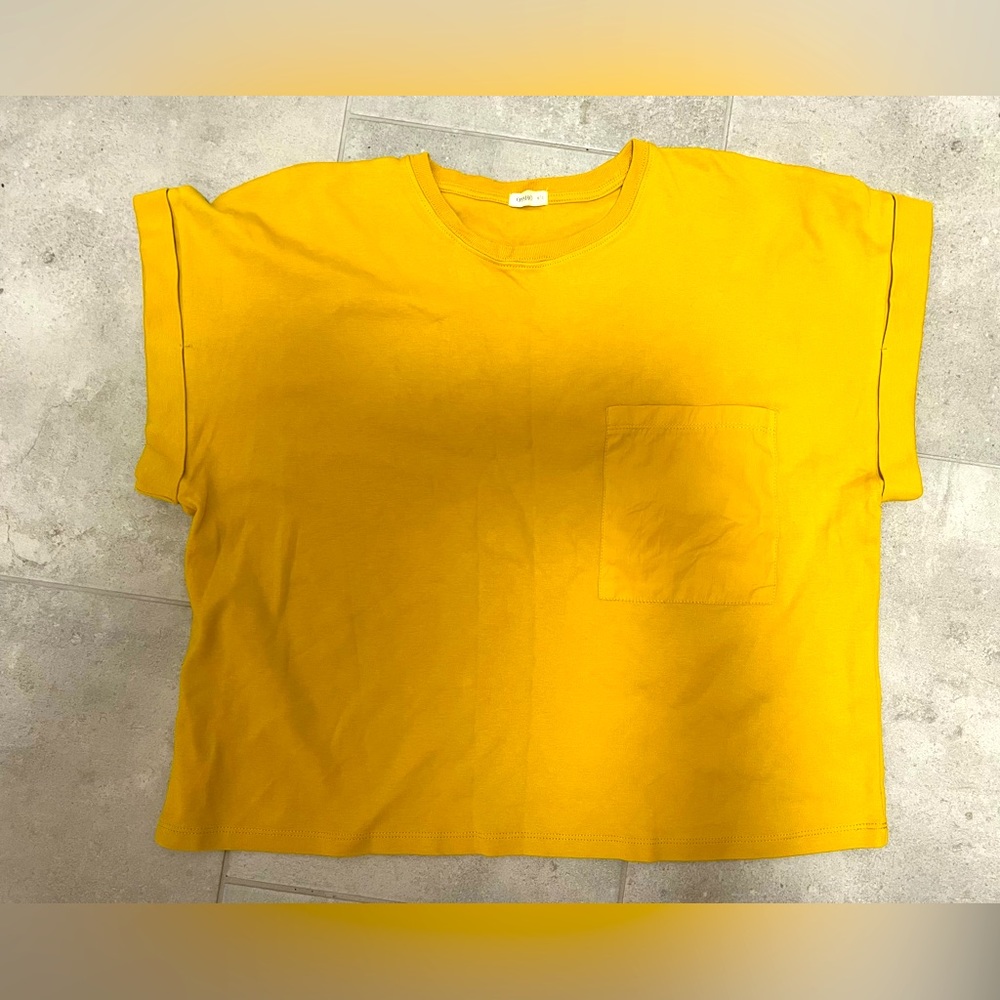Cropped short sleeved shirt with front pocket from Oysho